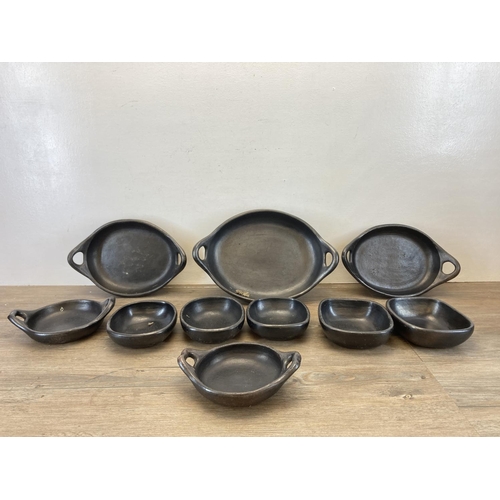 338 - A collection of Chamba black clay cookware