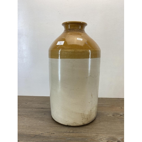 339 - An early 20th century stoneware bottle with impressed trademark - approx. 52cm high