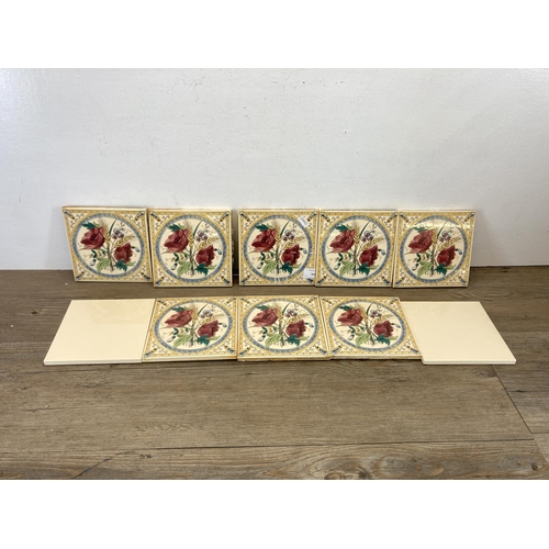 341 - Ten Stovax ceramic tiles, eight Victorian style floral design and two plain - approx. 15cm x 15cm