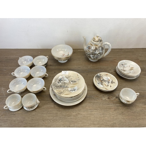 347 - A Japanese eggshell porcelain tea set