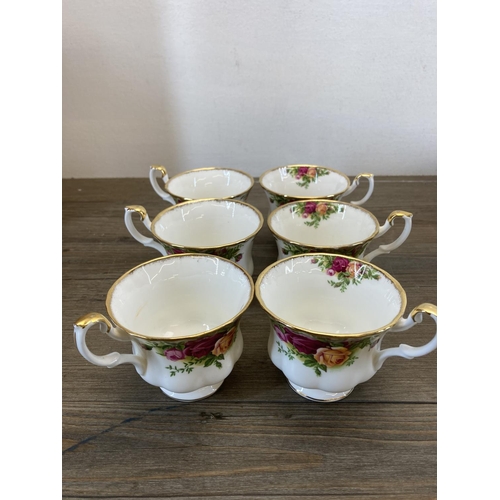 348 - Eighteen pieces of Royal Albert Old Country Roses bone china to include six tea cups, four saucers, ... 