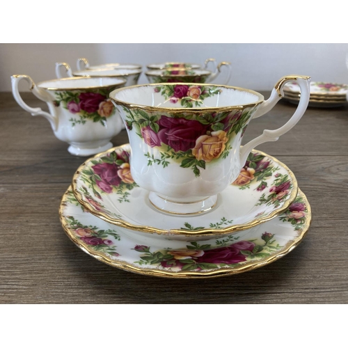 348 - Eighteen pieces of Royal Albert Old Country Roses bone china to include six tea cups, four saucers, ... 