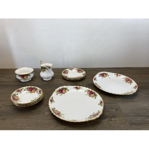 348 - Eighteen pieces of Royal Albert Old Country Roses bone china to include six tea cups, four saucers, ... 