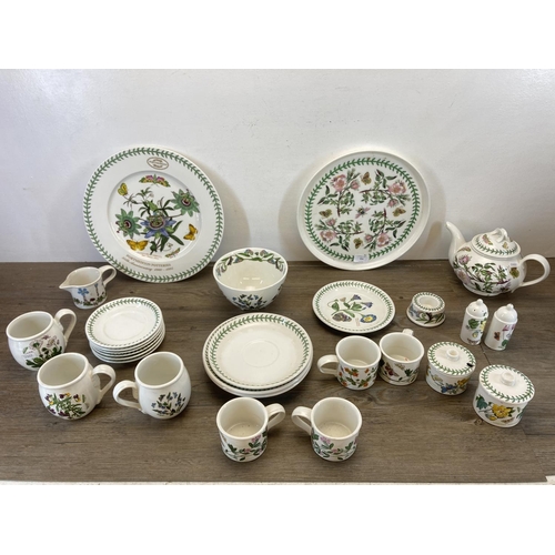 354 - A collection of Portmeirion The Botanic Garden dinnerware to include teapot, mugs, sugar bowl, salt ... 