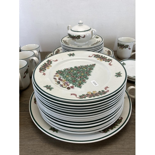 356 - A collection of Johnson Brothers Victorian Christmas tableware to include twelve 10cm mugs, teapot, ... 