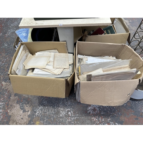 899 - Six boxes containing a large collection of antique and later book cut outs