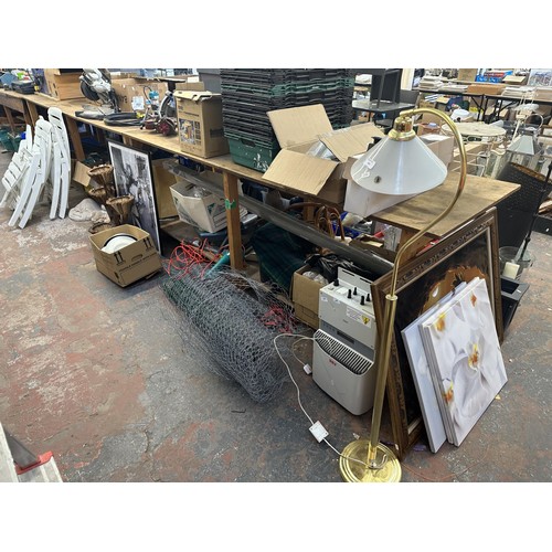 859 - A large collection of house clearance items to include handbags, Bosch hedge trimmer, chicken wire e... 