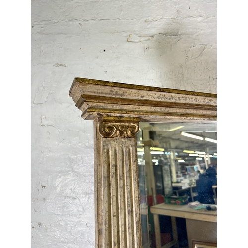 237 - A 19th century style white and gilt framed bevelled edge pier mirror - approx. 109cm high x 85cm wid... 