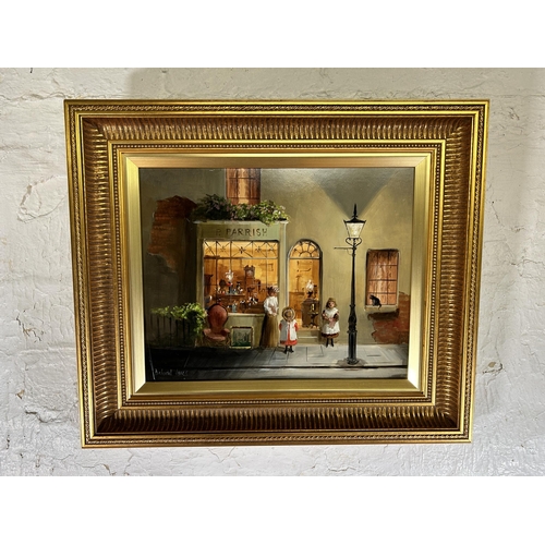 239 - A gilt framed Deborah Jones (1921-2012) oil on board of a 19th century shop front scene - approx. 45... 