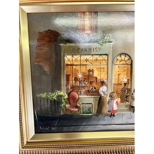 239 - A gilt framed Deborah Jones (1921-2012) oil on board of a 19th century shop front scene - approx. 45... 