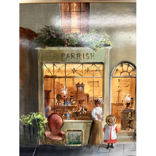 239 - A gilt framed Deborah Jones (1921-2012) oil on board of a 19th century shop front scene - approx. 45... 