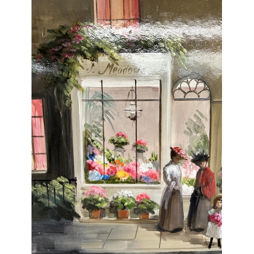 239A - A gilt framed Deborah Jones (1921-2012) oil on board of a 19th century shop front scene - approx. 45... 