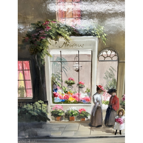 239A - A gilt framed Deborah Jones (1921-2012) oil on board of a 19th century shop front scene - approx. 45... 