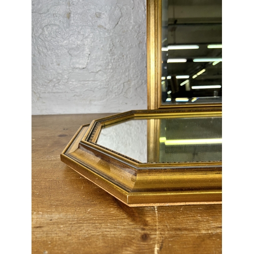 243 - Two gilt framed wall mirrors - largest approx. 84cm high x 58cm wide