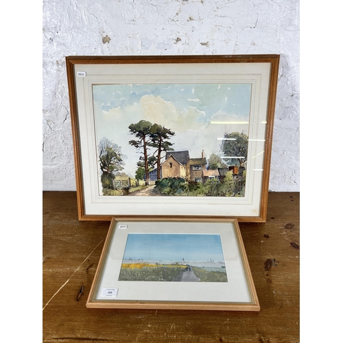 253 - Two framed watercolours to include one signed H. Stanley Traynor 2000 - largest approx. 50cm high x ... 