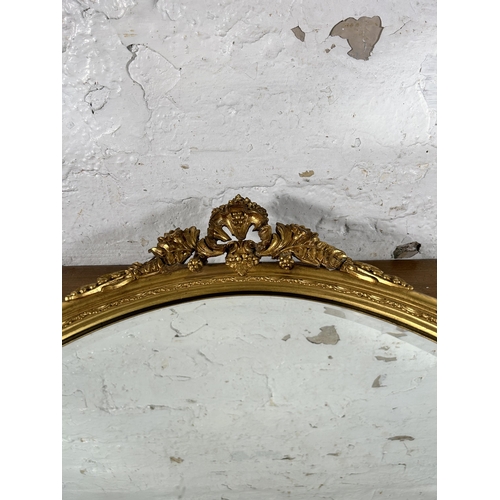 266 - A 19th century style gilt framed bevelled edge oval wall mirror - approx. 67cm high x 54cm wide