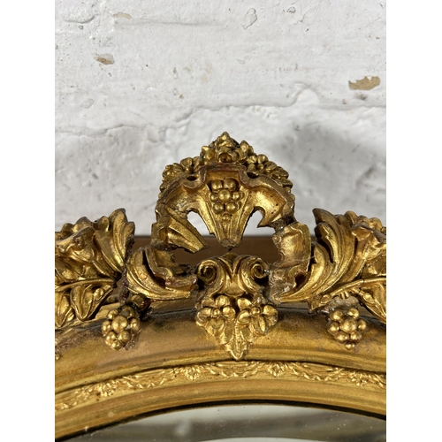 266 - A 19th century style gilt framed bevelled edge oval wall mirror - approx. 67cm high x 54cm wide