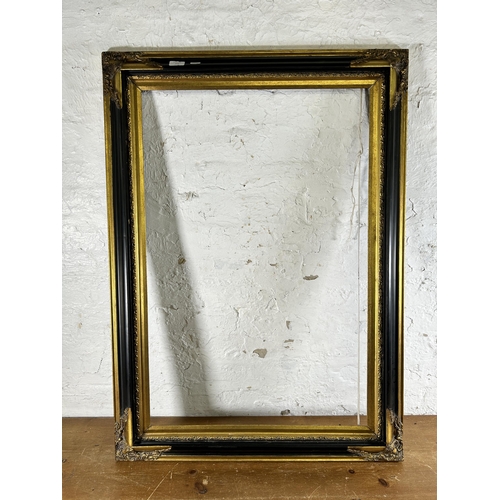 270 - A 19th century style black and gilt picture frame - approx. 79cm high x 110 wide