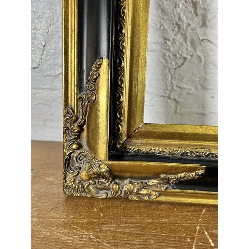 270 - A 19th century style black and gilt picture frame - approx. 79cm high x 110 wide