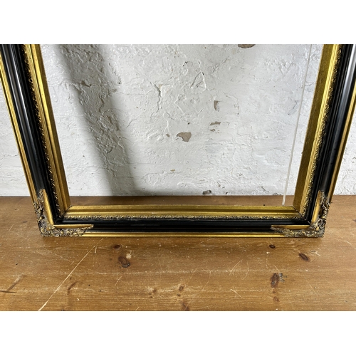 270 - A 19th century style black and gilt picture frame - approx. 79cm high x 110 wide