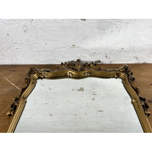 275 - A Rococo style gilt framed wall mirror - approx. 72cm high x 44cm wide