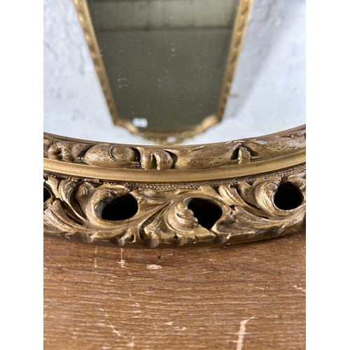 278 - Two gilt framed wall mirrors, one approx. 70cm high x 39cm wide and one approx. 57cm diameter