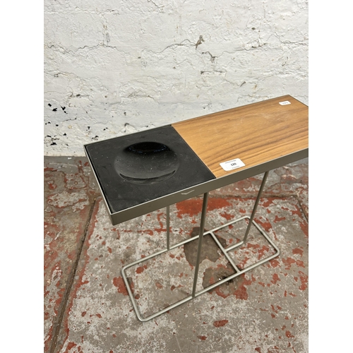 120 - A Peter McCann for Habitat metal and teak Companion table with black ceramic dish - approx. 44cm hig... 