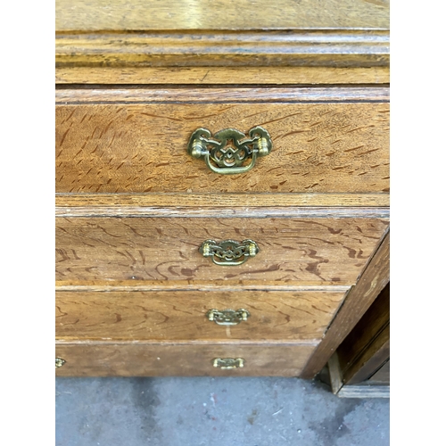 123 - An Edwardian oak chest of drawers - approx. 88cm high x 87cm wide x 45cm deep
