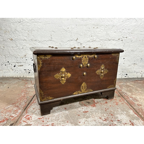 141 - A 20th century mahogany and brass bound twin handled chest with internal candle box - approx. 40cm h... 