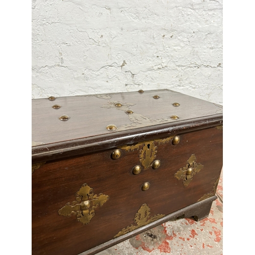 141 - A 20th century mahogany and brass bound twin handled chest with internal candle box - approx. 40cm h... 