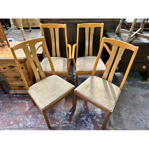 147 - Four Schreiber beech and teak effect dining chairs