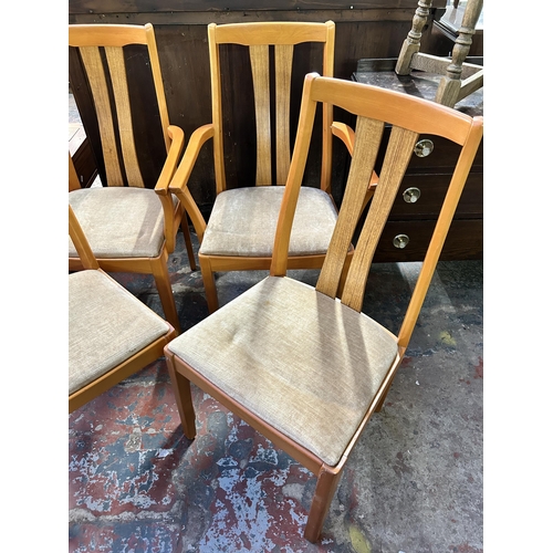 147 - Four Schreiber beech and teak effect dining chairs