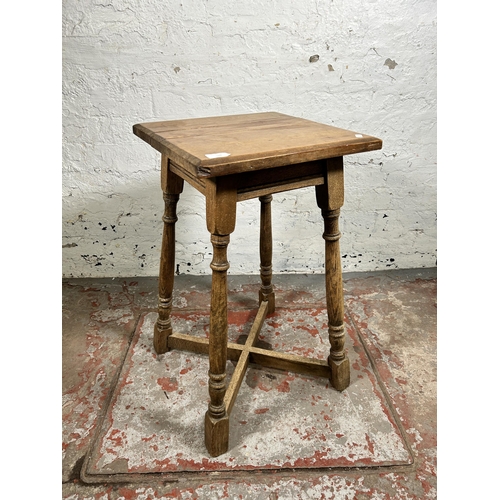 149 - A mid 20th century oak side table with Victorian pine top - approx. 68cm high x 39cm wide x 39cm dee... 