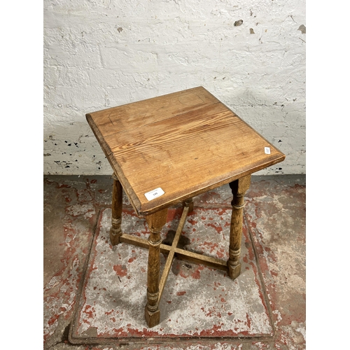 149 - A mid 20th century oak side table with Victorian pine top - approx. 68cm high x 39cm wide x 39cm dee... 