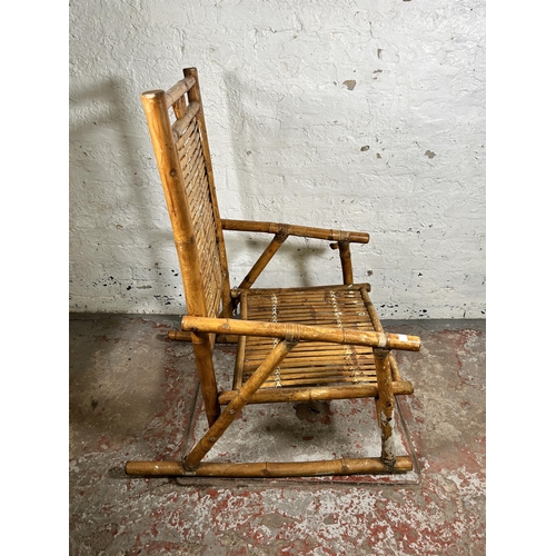 162 - A bamboo and wicker rocking chair