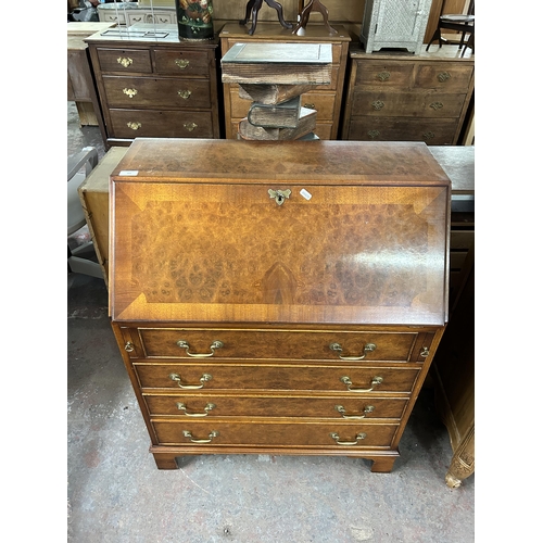 164 - A Bevan Funnell Ltd Reprodux burr walnut bureau on bracket supports - approx. 96cm high x 75cm wide ... 