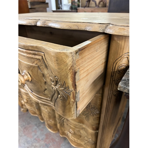 167 - A French carved pine serpentine chest of drawers - approx. 86cm high x 91cm wide x 45cm deep