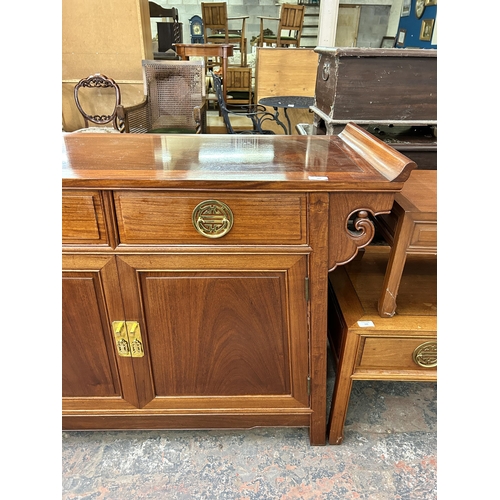 181 - A Chinese carved hardwood sideboard - approx. 88cm high x 124cm wide x 46cm deep