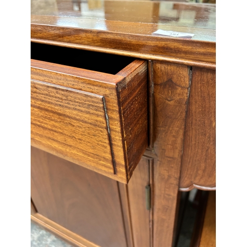 181 - A Chinese carved hardwood sideboard - approx. 88cm high x 124cm wide x 46cm deep