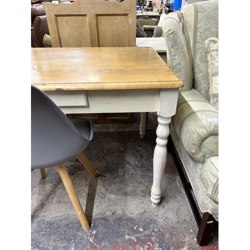 193 - A modern solid oak and white painted single drawer farmhouse dining table and grey plastic and beech... 