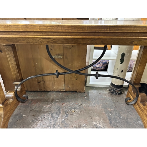 197 - A Gothic style solid oak and wrought iron console table - approx. 80cm high x 50cm wide x 150cm long