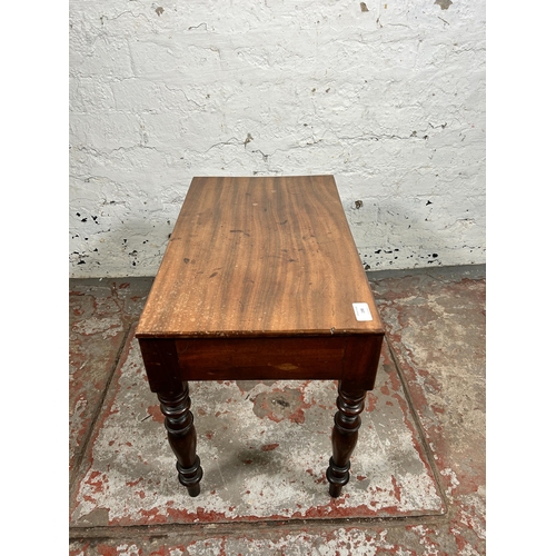 198 - A 19th century mahogany rectangular side table with turned supports - approx. 45cm high x 43cm wide ... 