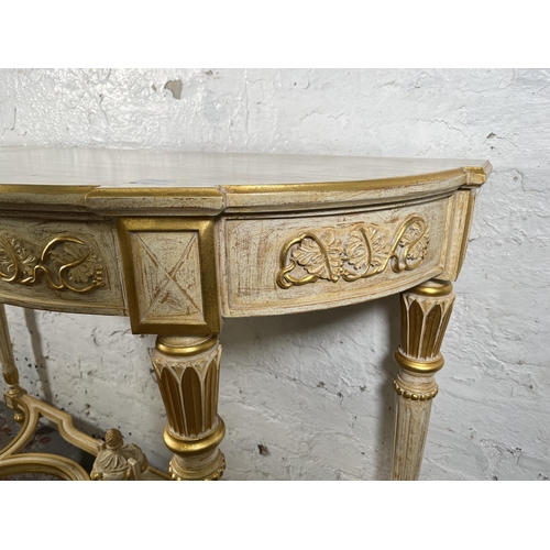 1 - A French Louis XVI style white and gold painted console table - approx. 88cm high x 126cm wide x 46c... 