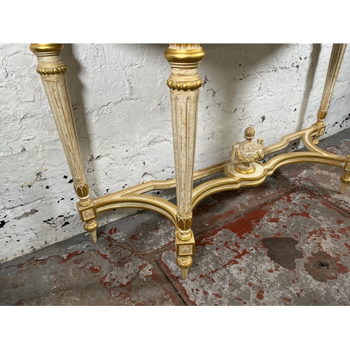 1 - A French Louis XVI style white and gold painted console table - approx. 88cm high x 126cm wide x 46c... 