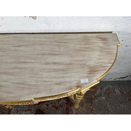 1 - A French Louis XVI style white and gold painted console table - approx. 88cm high x 126cm wide x 46c... 