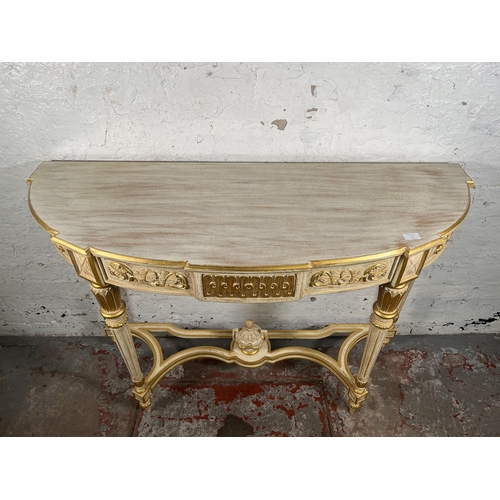 1 - A French Louis XVI style white and gold painted console table - approx. 88cm high x 126cm wide x 46c... 