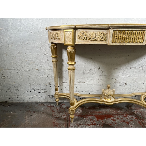 1 - A French Louis XVI style white and gold painted console table - approx. 88cm high x 126cm wide x 46c... 