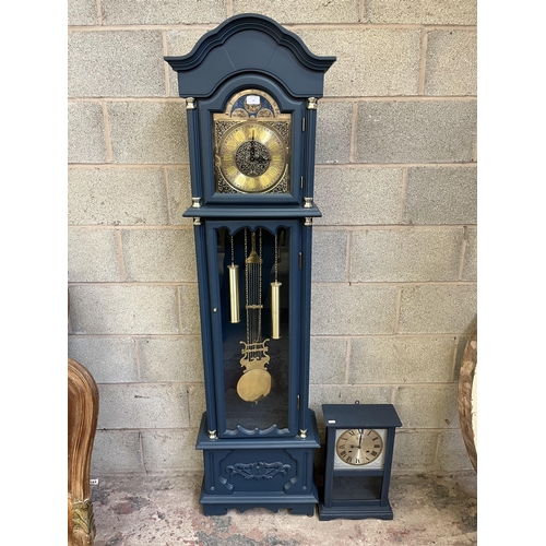 10 - Two blue painted clocks, one Emperor grandmother clock with brass weights and pendulum - approx. 181... 