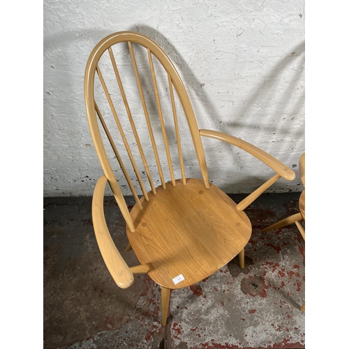 111 - A pair of Ercol Windsor blonde elm and beech Quaker carver dining chairs