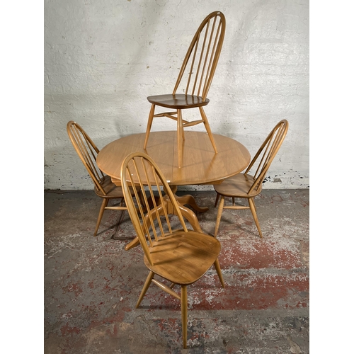 An Ercol Windsor blonde elm and beech oval extending dining table and four Quaker dining chairs - approx. 75cm high x 109cm wide x 120cm long